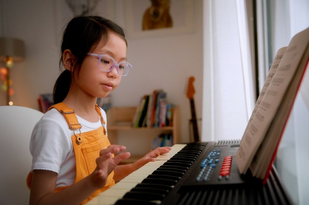 SightGlass girl playing piano